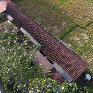 Onduvilla shaded brown curved roof