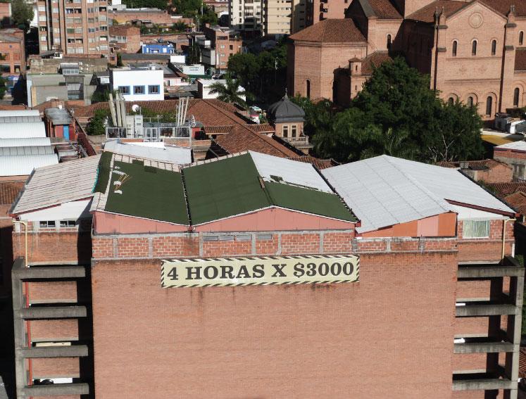 overroofing building in Colombia with Onduline Classic green